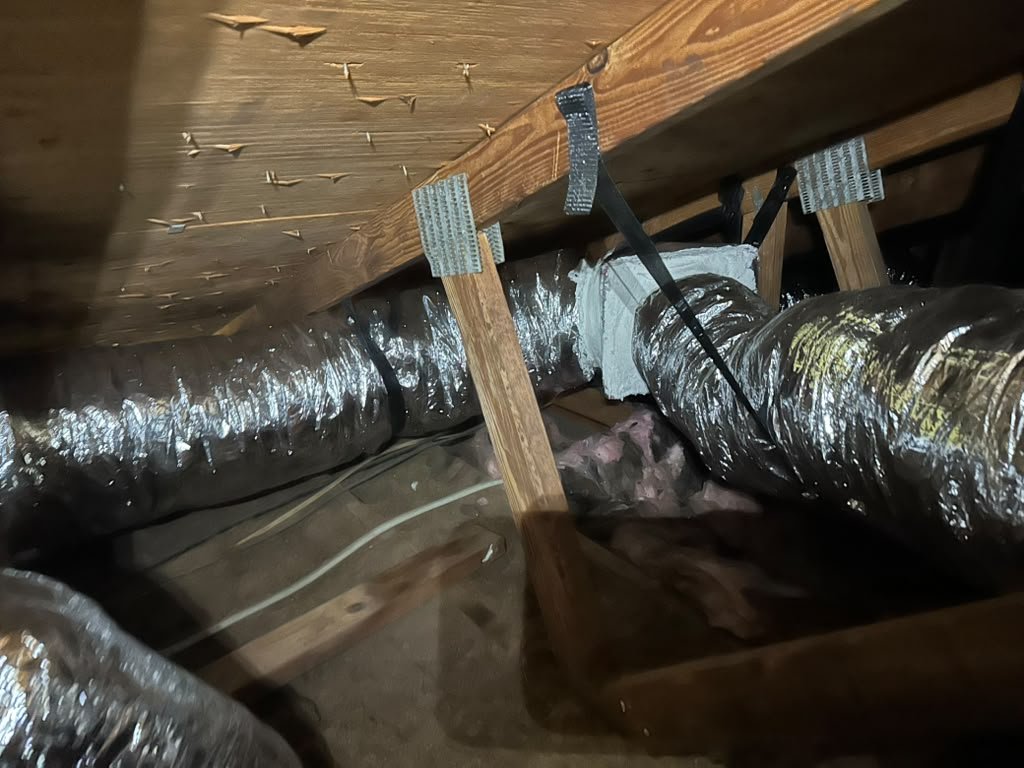 New R-6 flex duct installed in an attic in Tampa, FL 33625.