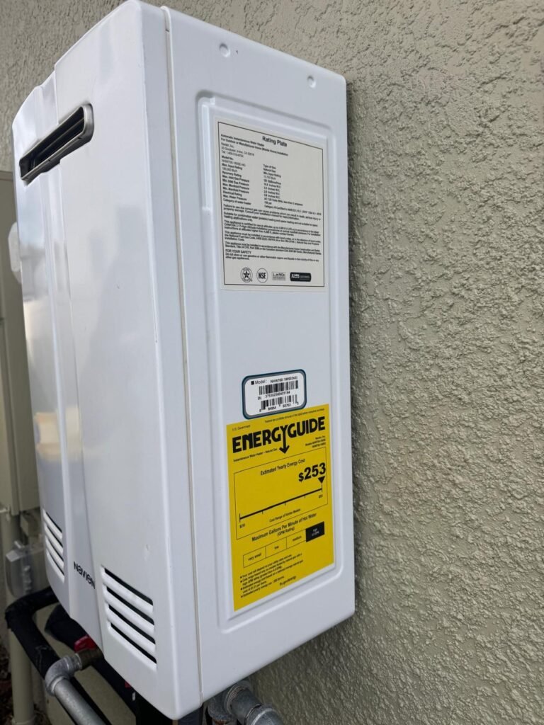 Close-up of tankless water heater with energy guide in Land O' Lakes, FL 34637.