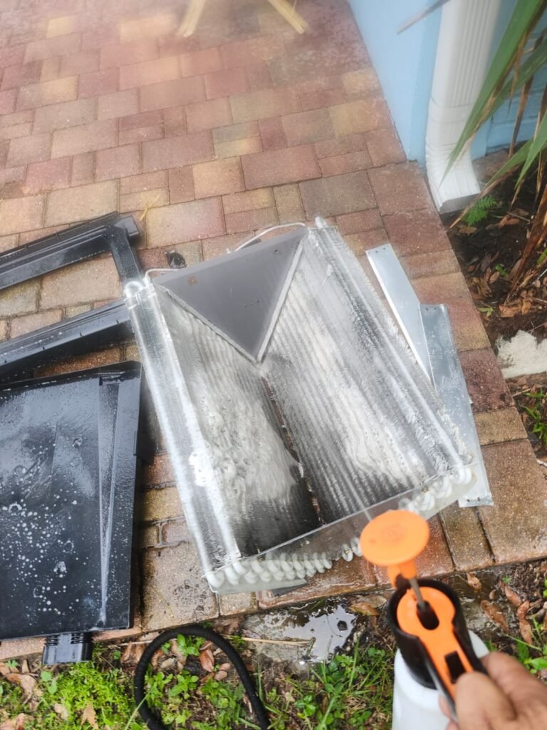 An evaporator coil pulled out for a cleaning in Clearwater, FL 33756.