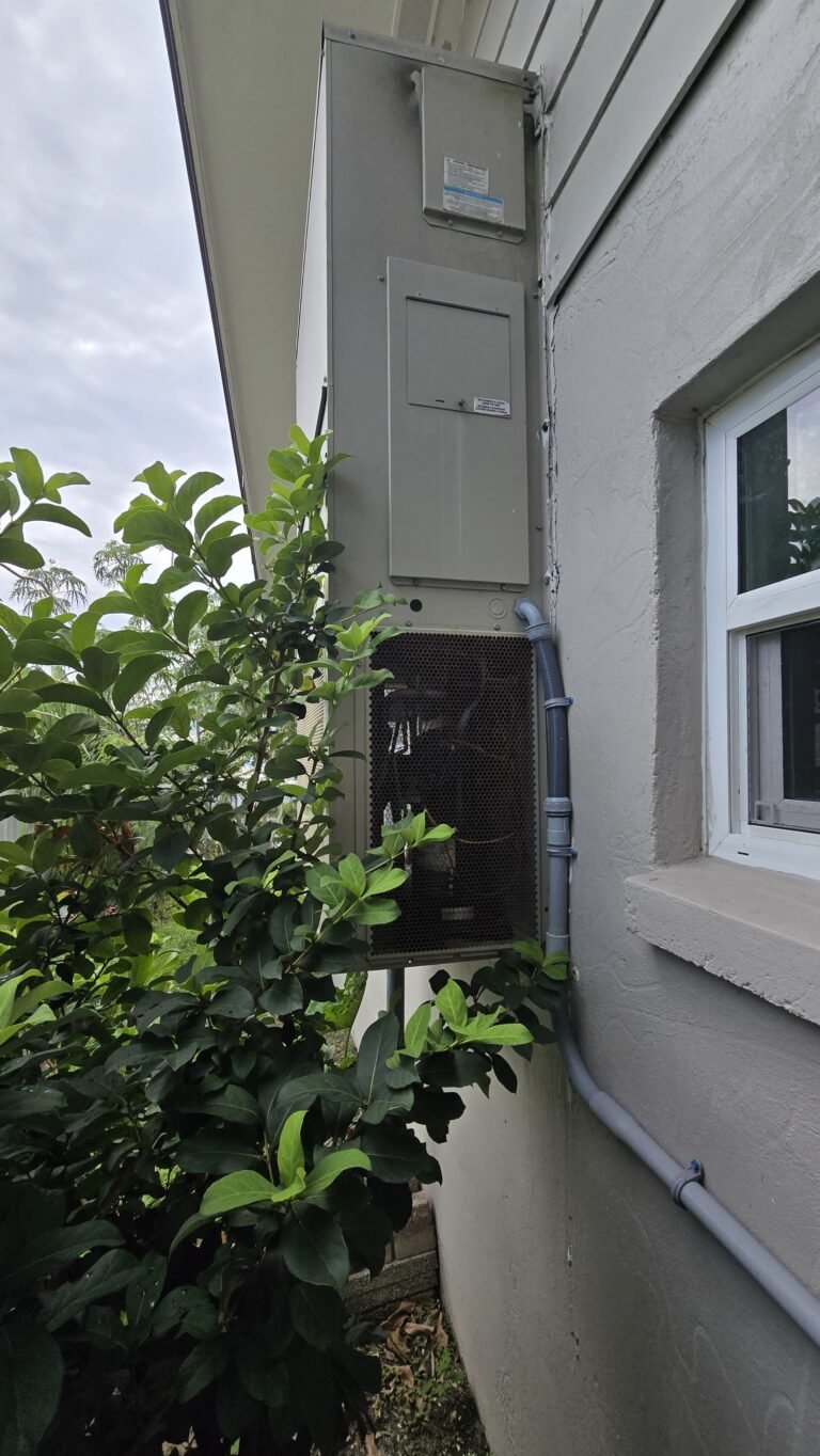Exterior view of HVAC unit with foliage in Tampa, FL 33615