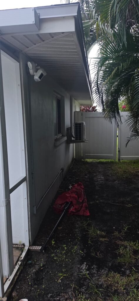 Exterior View with Outdoor Unit in Largo, FL 33774 Exterior view with outdoor unit on wall in Largo, FL 33774