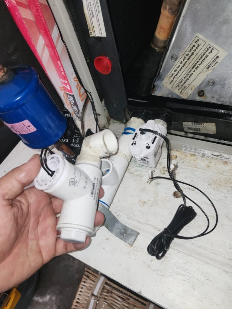 A float switch on the condensate drain line at an air handler in Tampa, FL 33610.