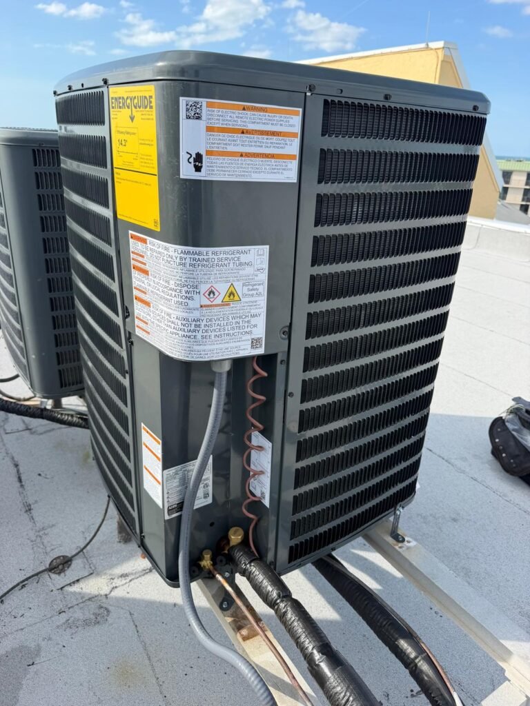 A Goodman condenser installed on a rooftop in Indian Rocks Beach, FL 33785.