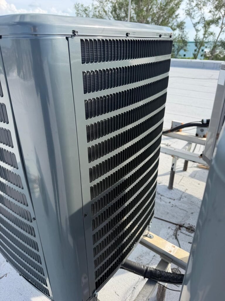 Goodman condenser unit with venting on rooftop in Indian Rocks Beach, FL 33785
