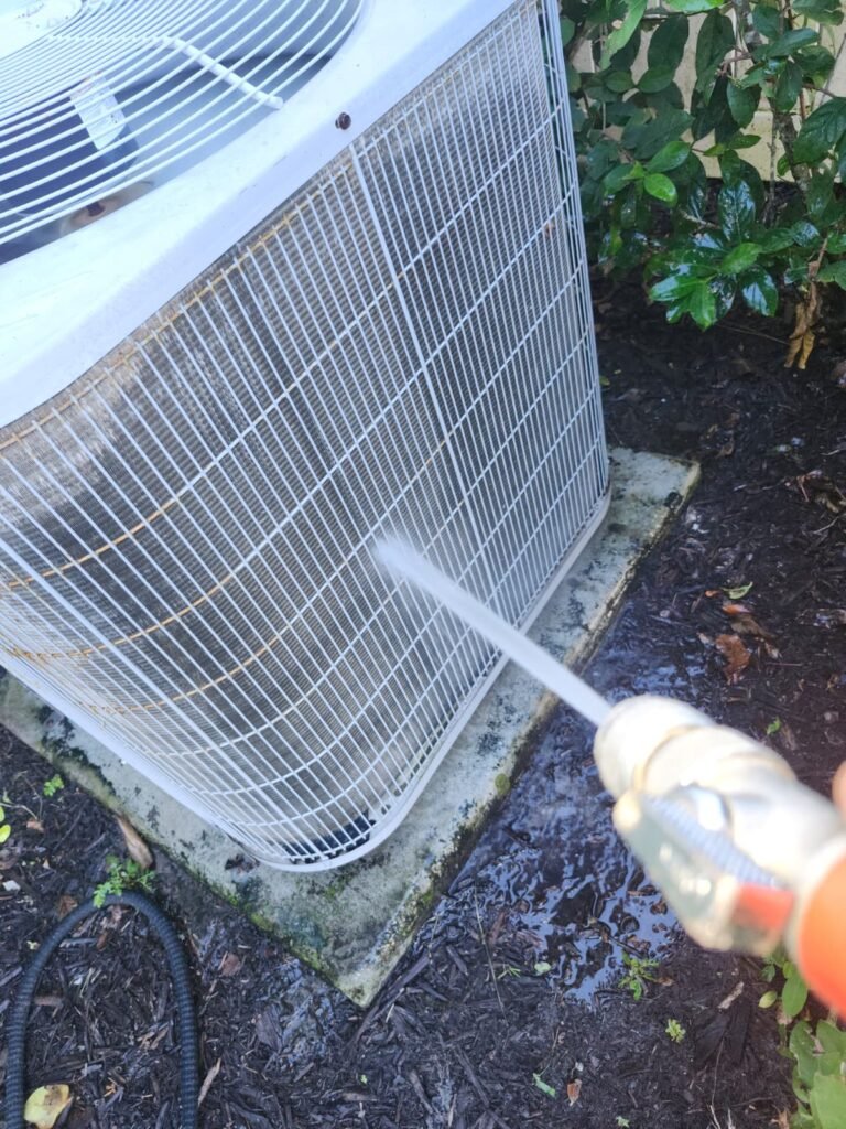 HVAC unit cleaning during maintenance in Tampa, FL 33626