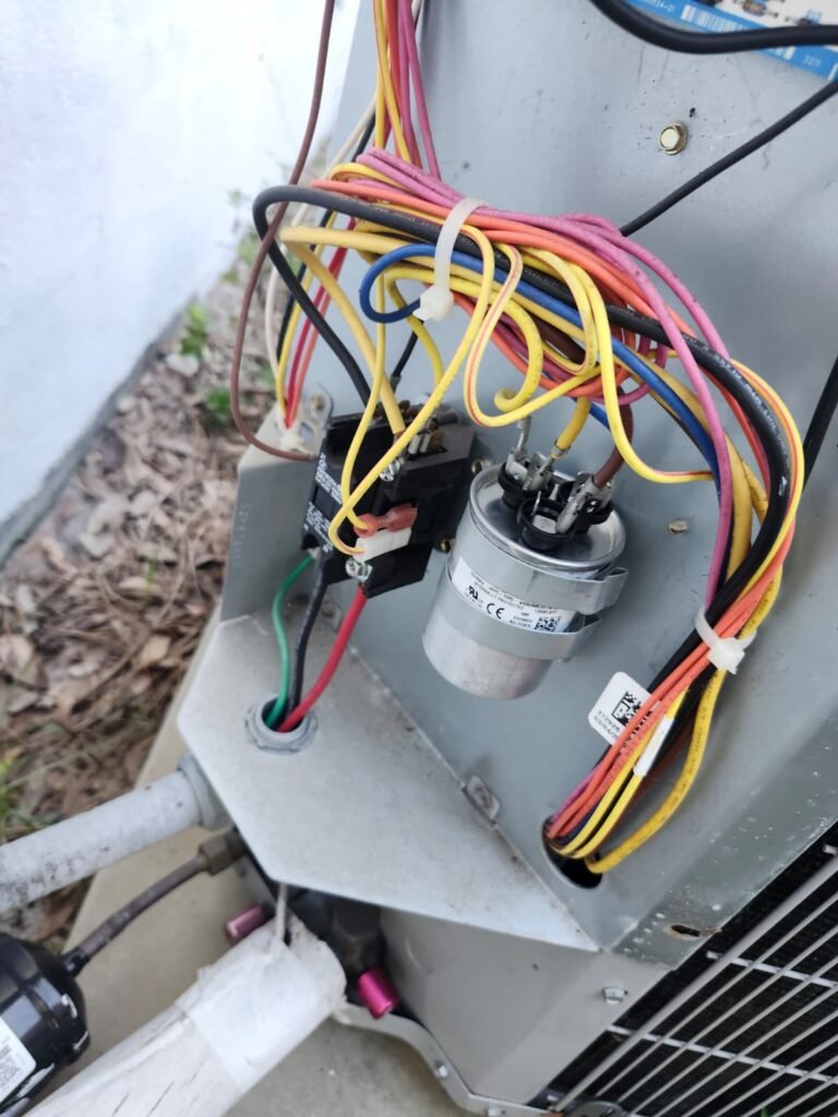 HVAC Wiring and Capacitor Detail in St. Petersburg, FL 33714 Close-up of HVAC wiring and capacitor in St. Petersburg, FL 33714