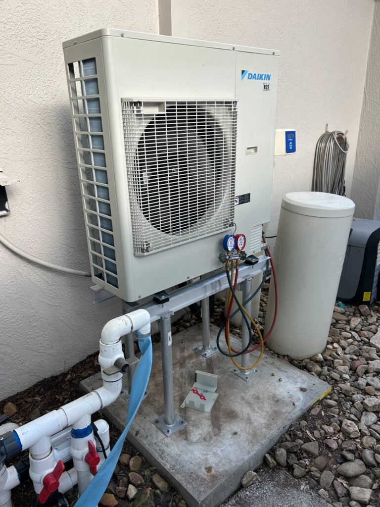 A new Daikin R-32 condenser with gauges connected in Tampa, FL 33609.