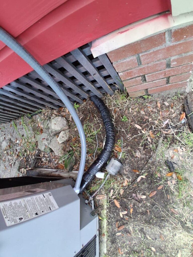 Outdoor AC unit with insulated lines in Tampa, FL 33605