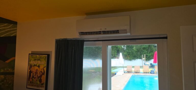 Mini-Split Installation with Pool View in Largo, FL 33774 Indoor mini-split unit above window with pool view in Largo, FL 33774