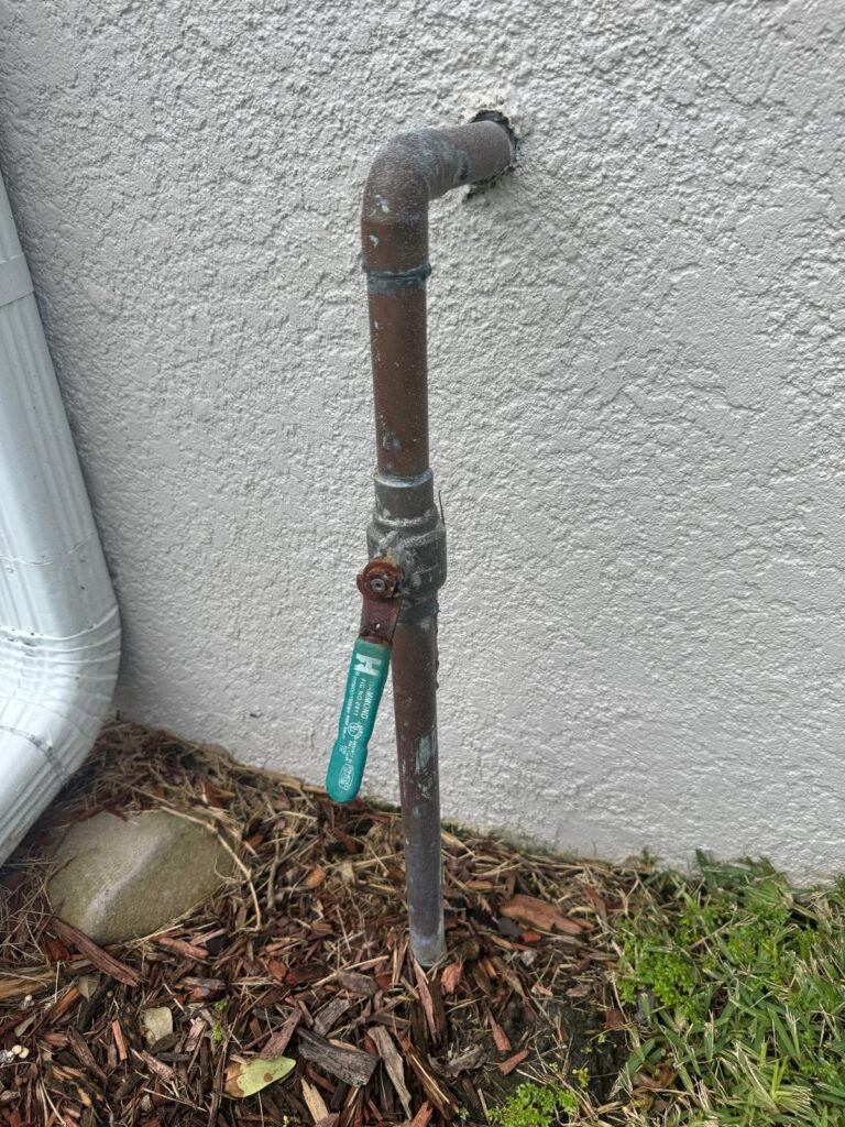 An old main shutoff valve on the supply line before replacement in Wesley Chapel, FL 33544.