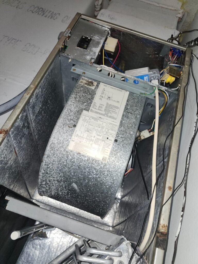 Open HVAC unit showing components in Tampa, FL 33626