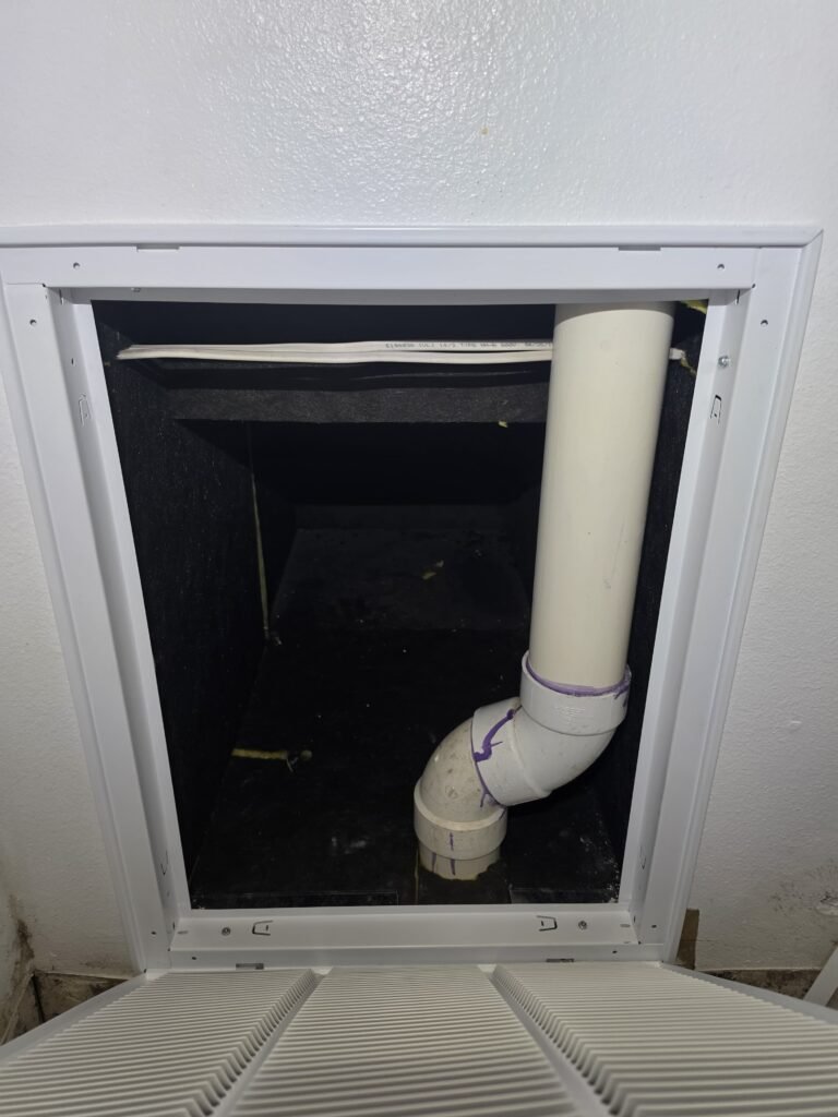 Interior view of PVC drain line and ductwork, Ruskin, FL 33570.