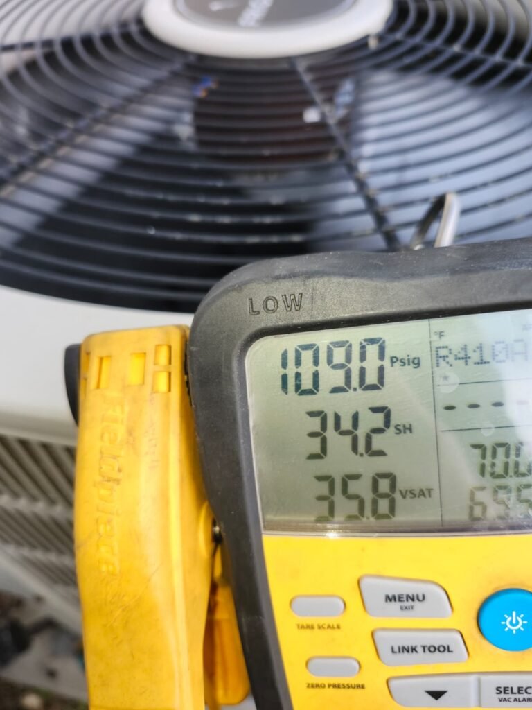 Refrigerant Pressure Check in Valrico, FL 33594 Refrigerant pressure readings during HVAC maintenance in Valrico, FL 33594