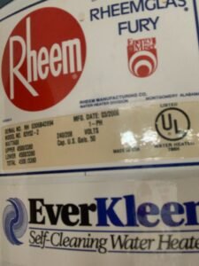 Close-up of Rheem water heater label, Odessa, FL 33556