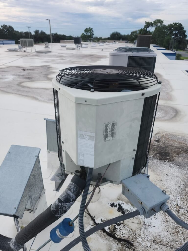 HVAC condenser on a commercial rooftop in Tampa, FL 33610