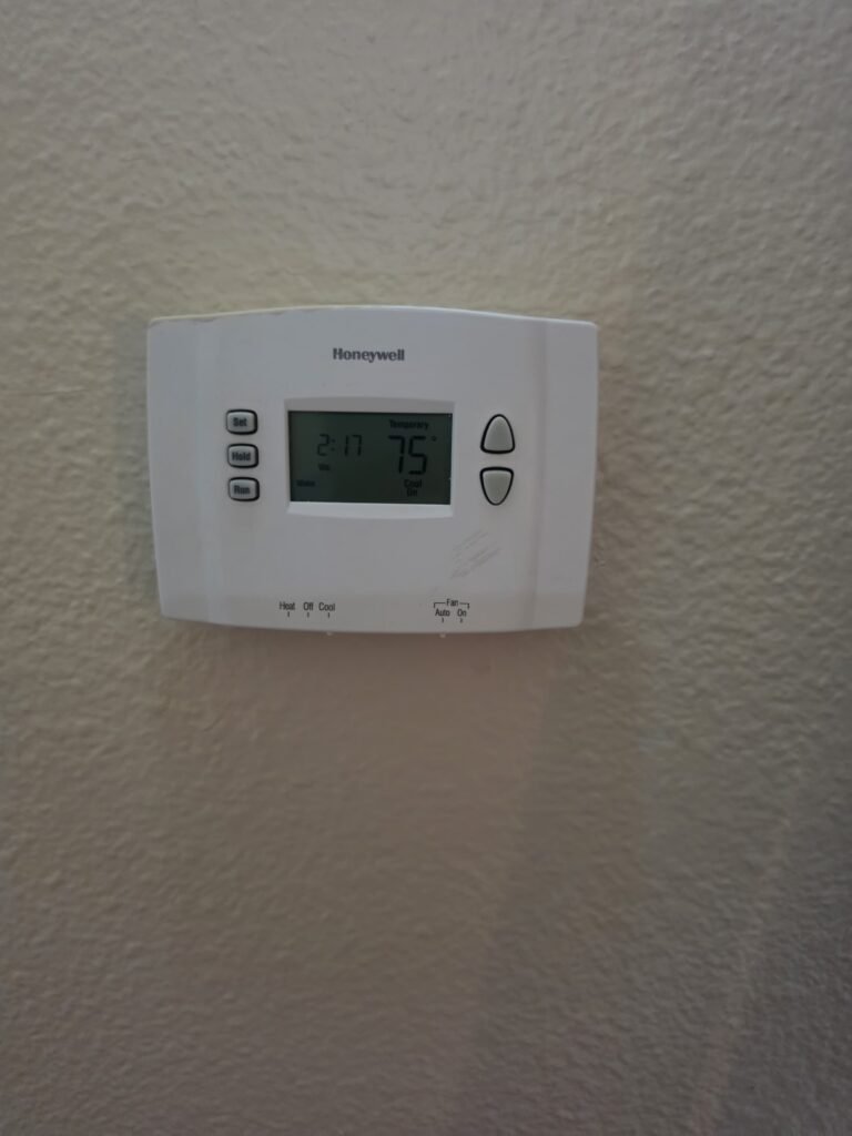 Thermostat Display in Tampa, FL 33605 Thermostat showing 75 degrees in Tampa, FL 33605