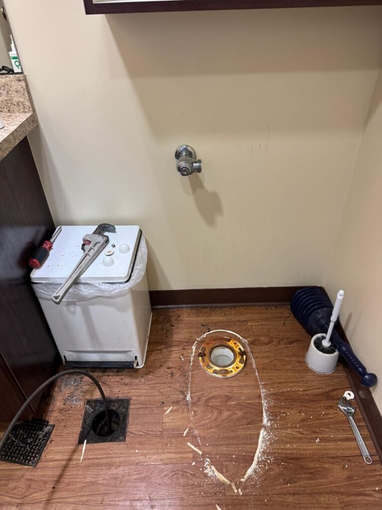 Toilet Removal in Progress in New Port Richey, FL 34652 Bathroom floor with toilet removed in New Port Richey, FL 34652