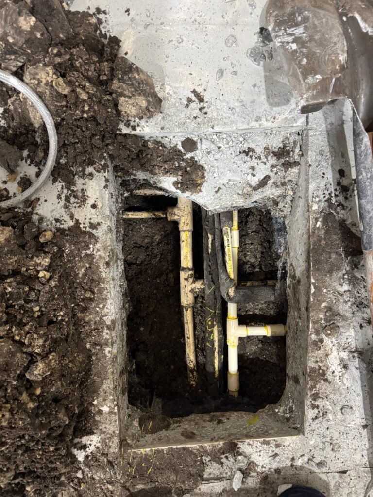 A trench cut through concrete for a new water line in Largo, FL 33773.