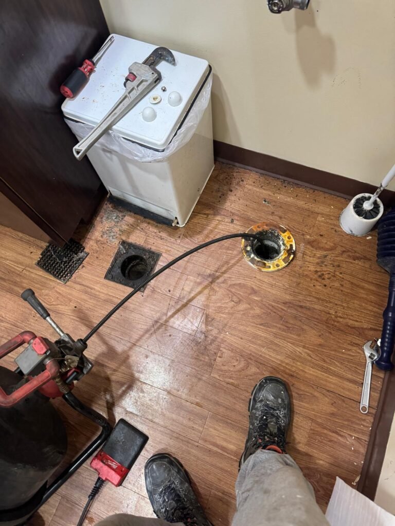 Unclogging Tools in New Port Richey, FL 34652 Tools and equipment on bathroom floor in New Port Richey, FL 34652