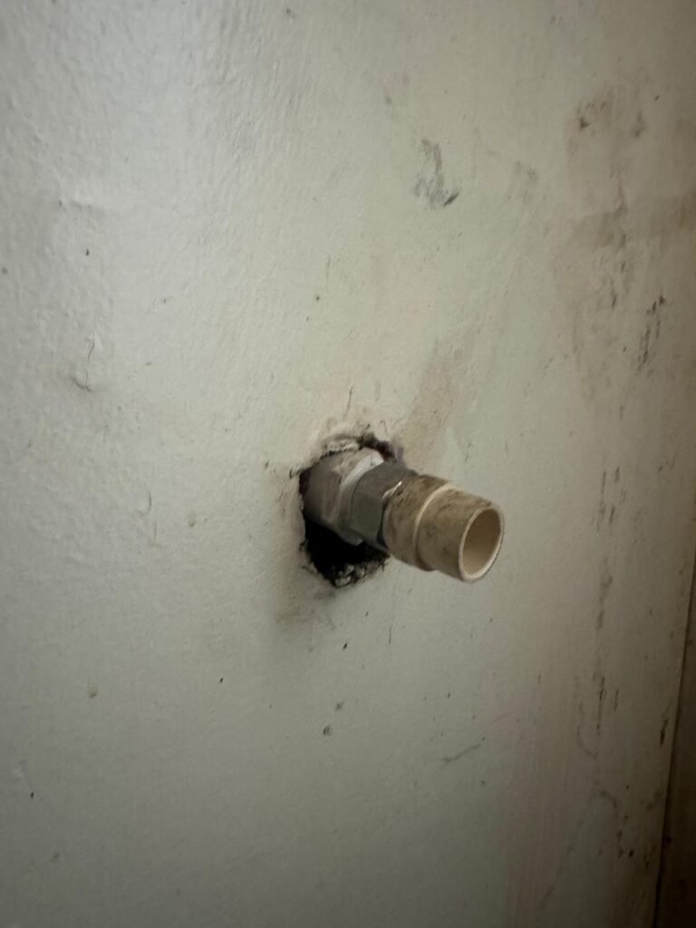 Wall penetration with pipe fitting, Tampa, FL 33612