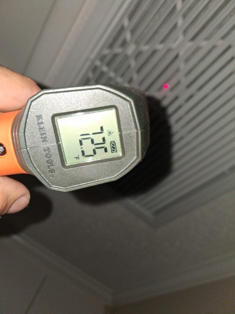 Infrared thermometer reading during AC tune-up in Clearwater, FL 33762