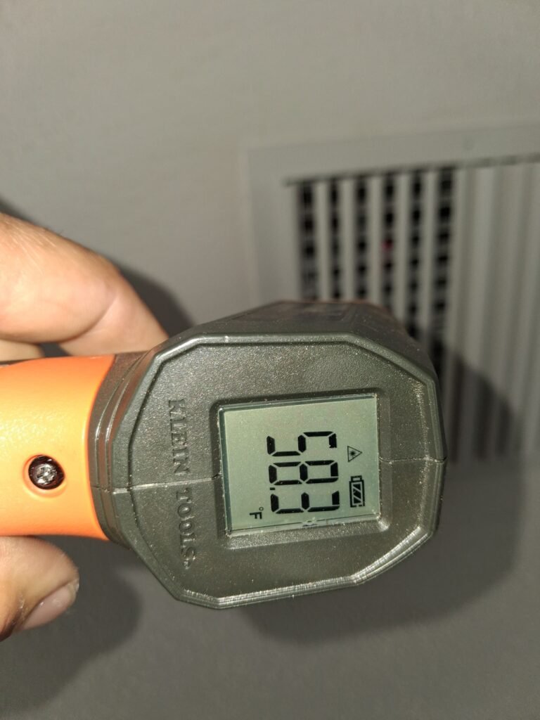 Infrared thermometer reading during AC tune-up in Clearwater, FL 33762