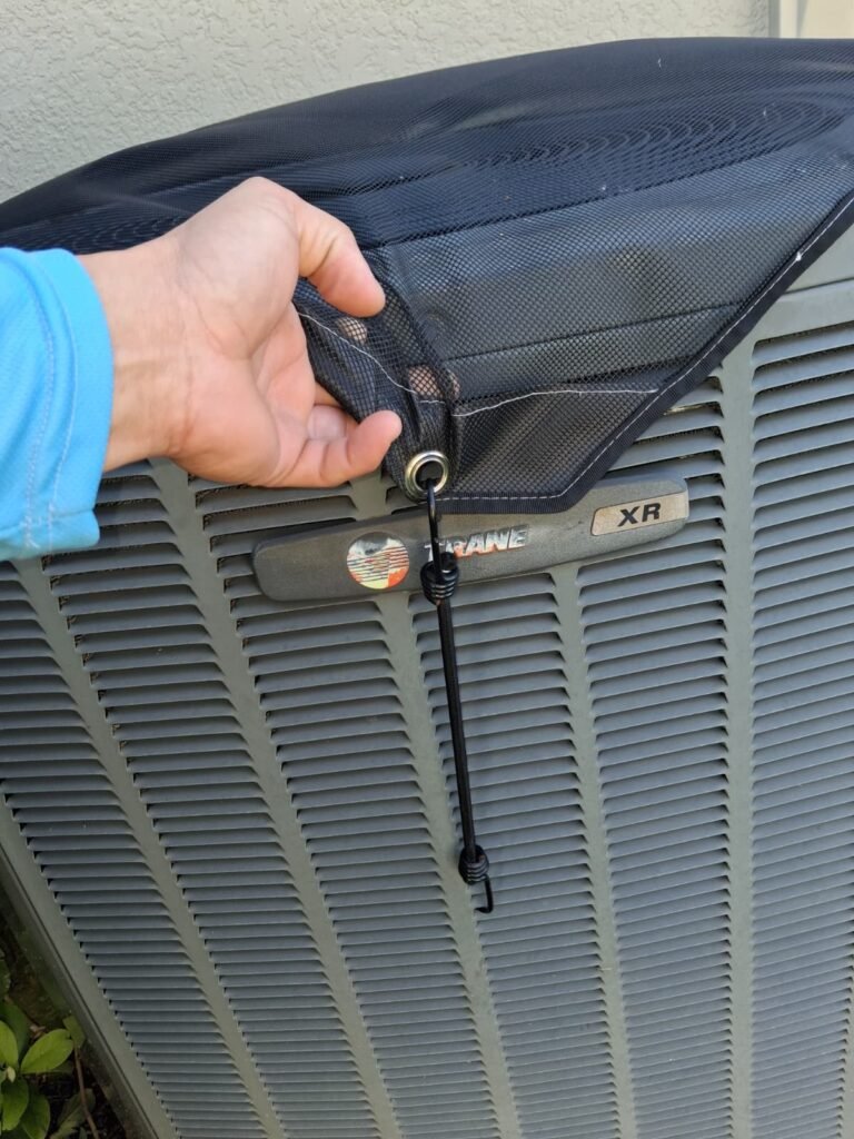 Adjusting HVAC unit cover in Wesley Chapel, FL 33544