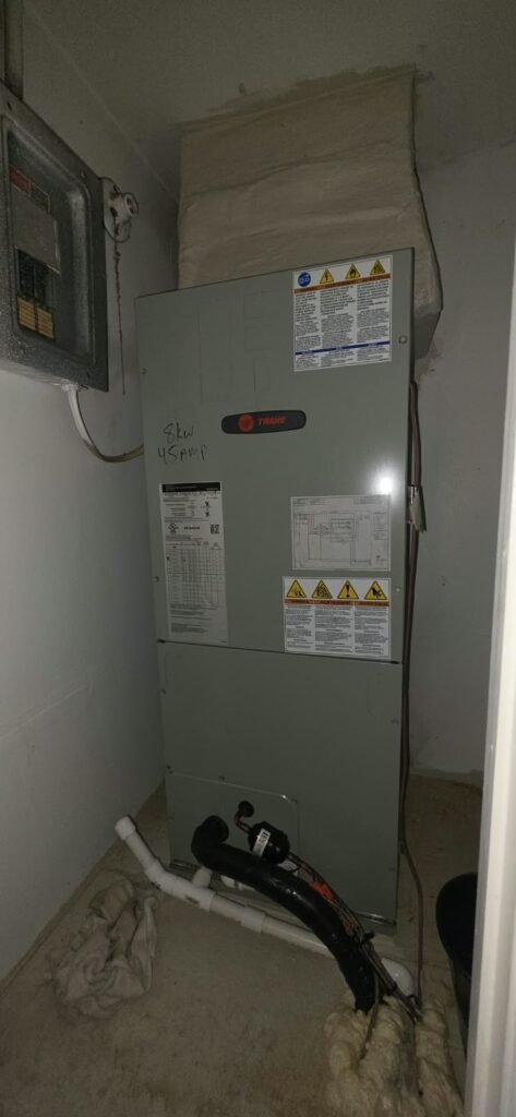 Serviced air handler unit with labels in Tampa, FL 33615