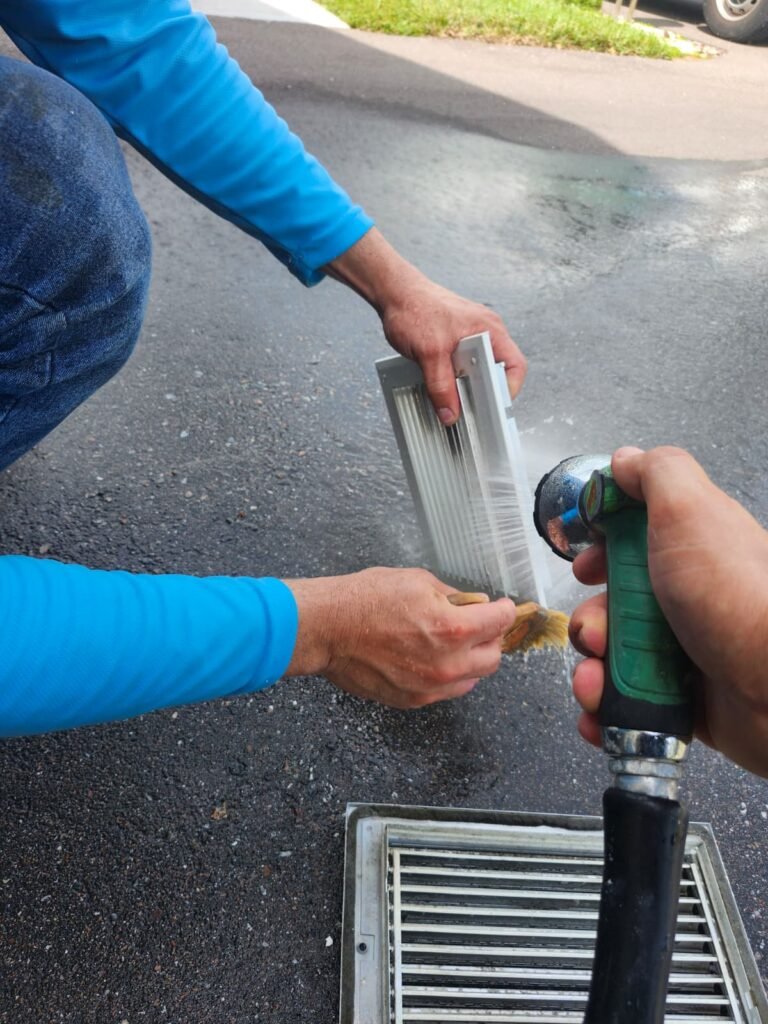 Air vent cleaning with hose and brush in Dunedin, FL 34698