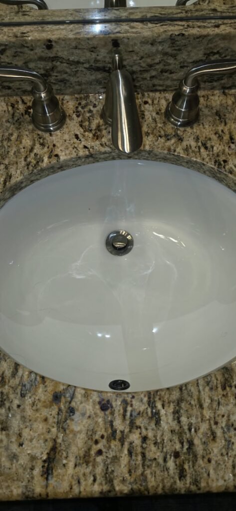 Bathroom sink with granite countertop in Tarpon Springs, FL 34689
