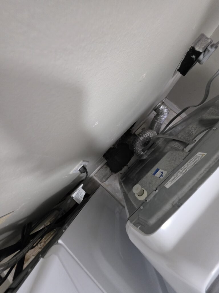 Behind Dryer with Connections in Brandon, FL 33511 Behind dryer showing vent and connections in Brandon, FL 33511