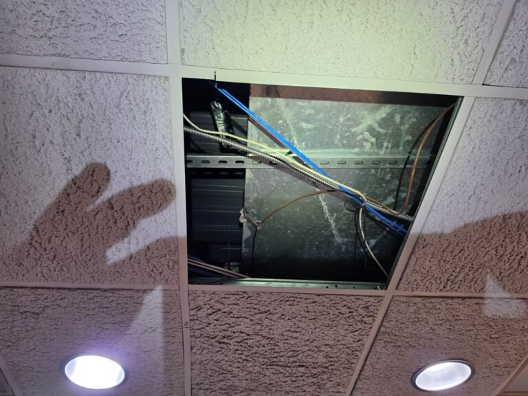 Ceiling panel removed with wiring in New Port Richey, FL 34652