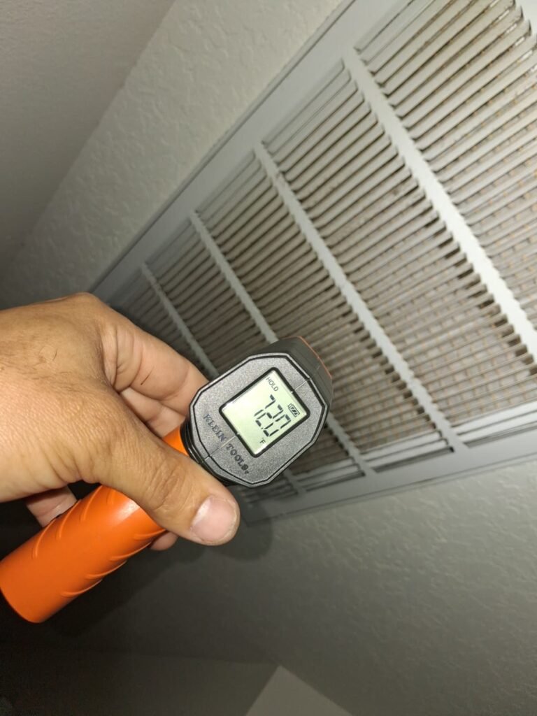 Temperature gun near ceiling vent in Wesley Chapel, FL 33544