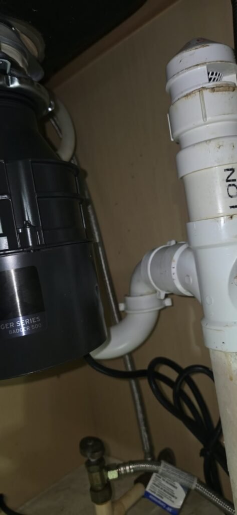 Close-up of installed garbage disposal in Lithia, FL 33547