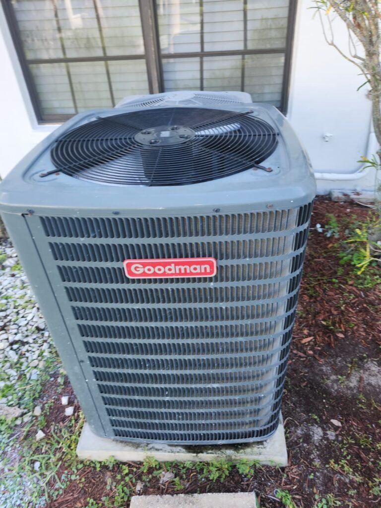 Close-up of outdoor AC unit with brand label in Clearwater, FL 33762