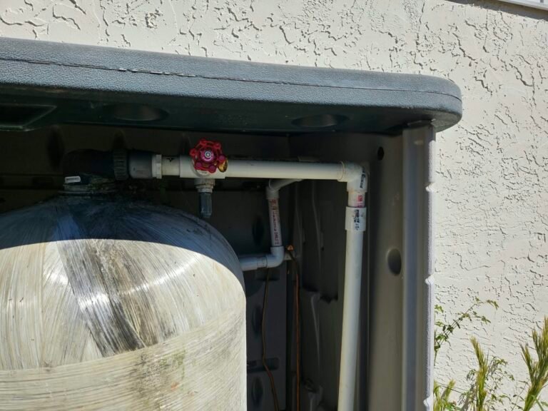Close-up of PVC Drain Line in Hudson, FL 34667 Close-up of PVC drain line and water tank in Hudson, FL 34667