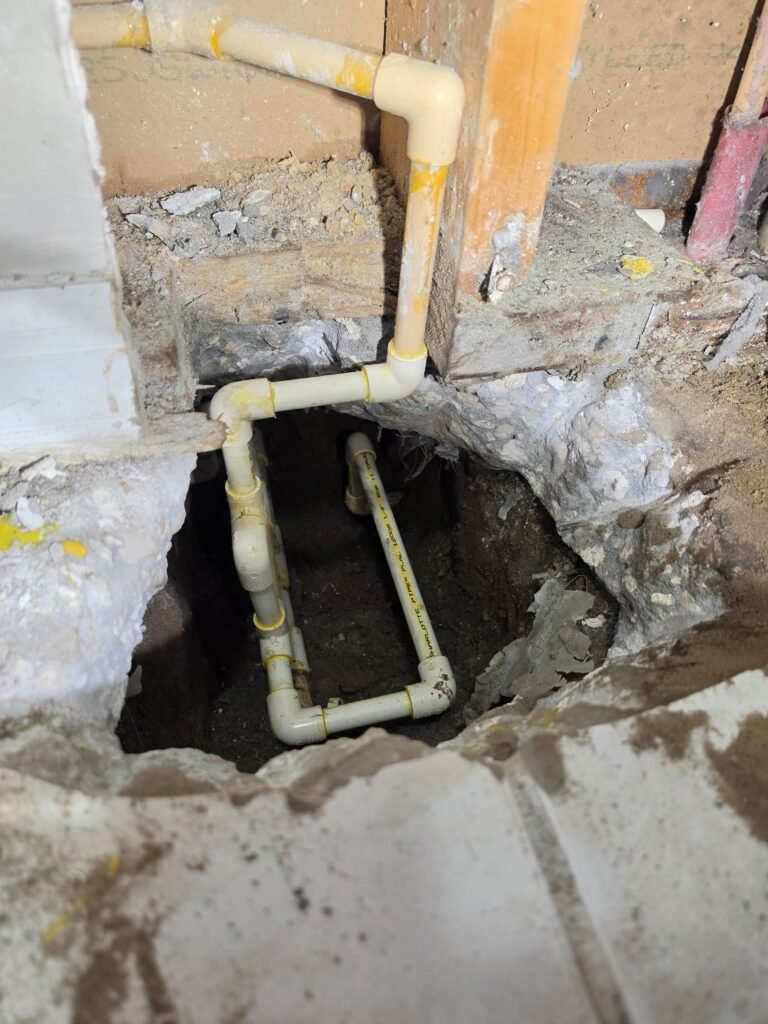 CPVC Pipes in Concrete Floor Hole, Brandon, FL 33511 CPVC pipes visible in concrete floor hole, Brandon, FL 33511