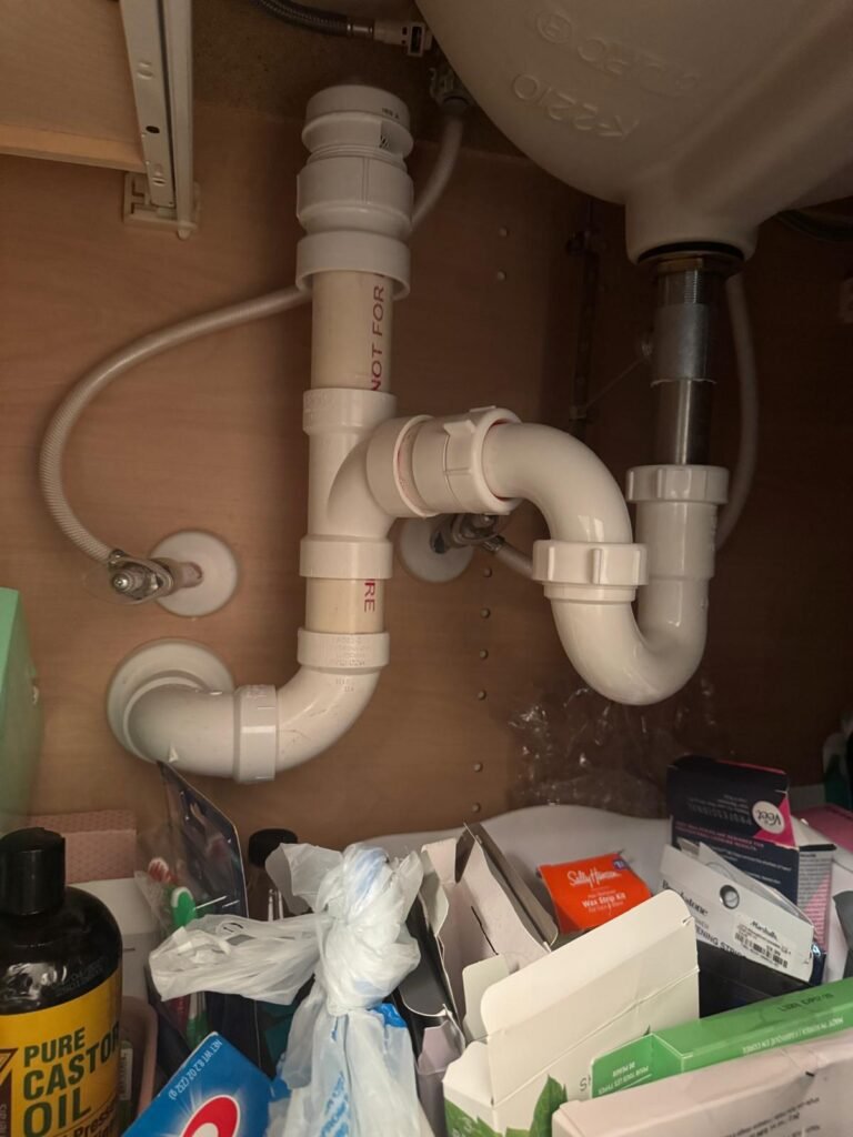 Detailed Plumbing Pipes Under Sink in Wesley Chapel, FL 33543 Detailed view of plumbing pipes under sink, Wesley Chapel, FL 33543