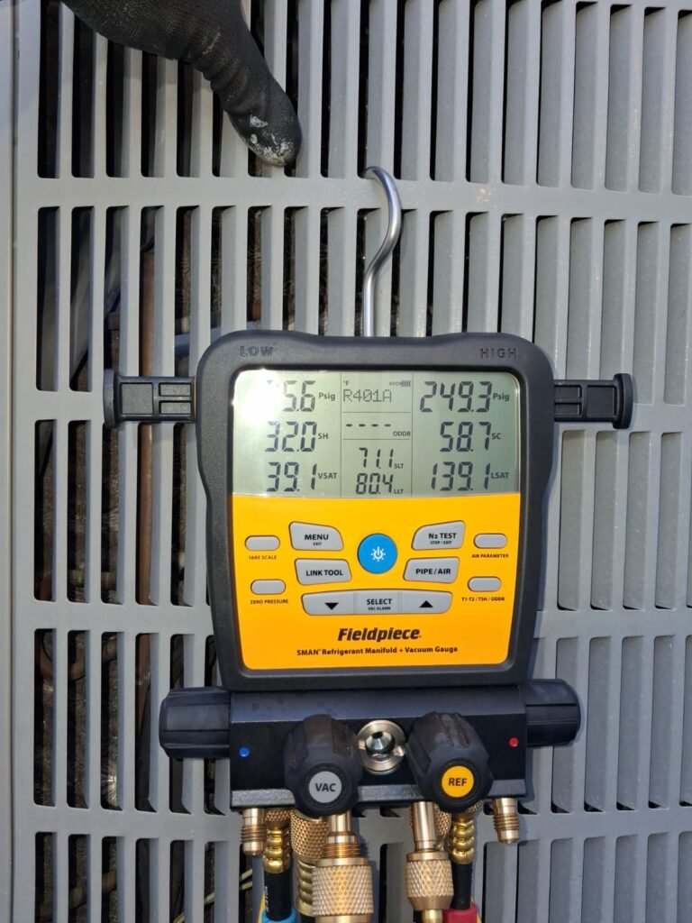 Digital manifold gauge on HVAC unit in Brandon, FL 33511