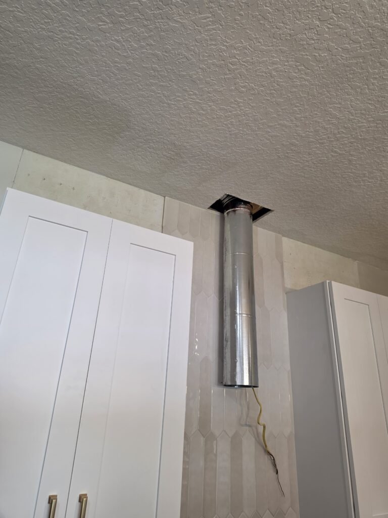 Duct Pipe Installation in Ruskin, FL 33570 Duct pipe installation above kitchen cabinets in Ruskin, FL 33570