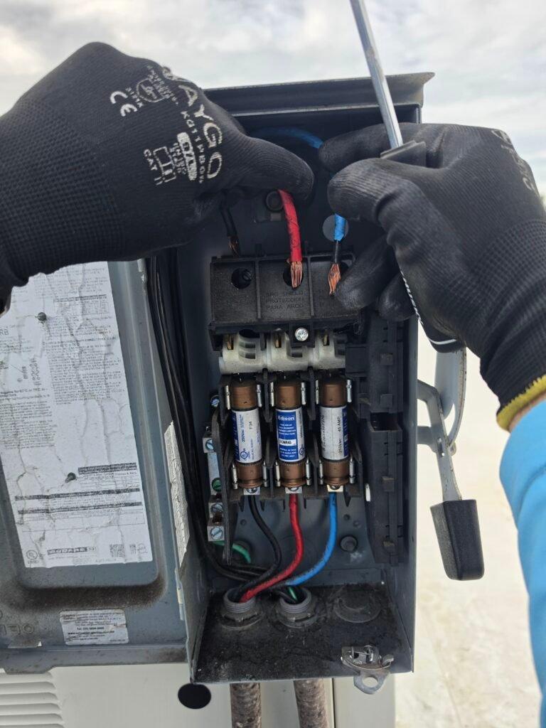 Technician working on electrical connections in Riverview, FL 33579