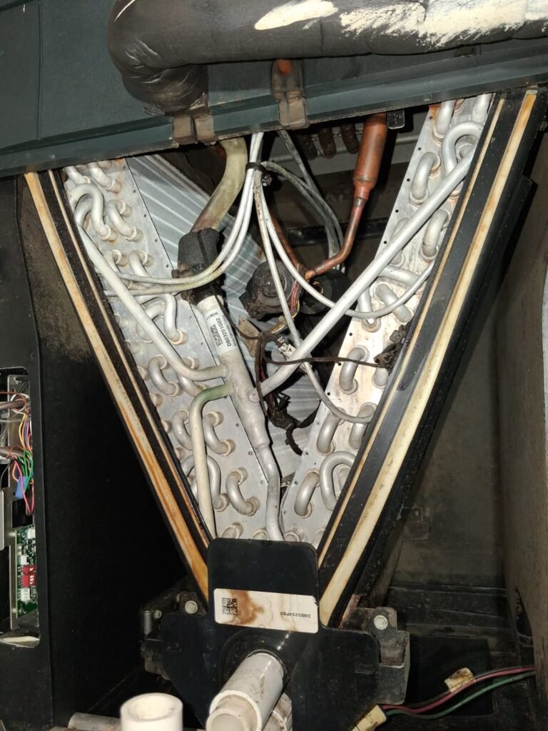 Exposed internal components of HVAC system in Brandon, FL 33511