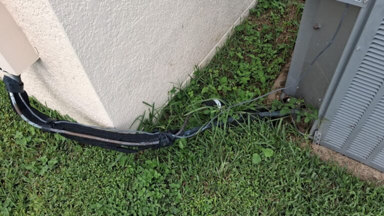 Exterior HVAC unit with connections in Wesley Chapel, FL 33545