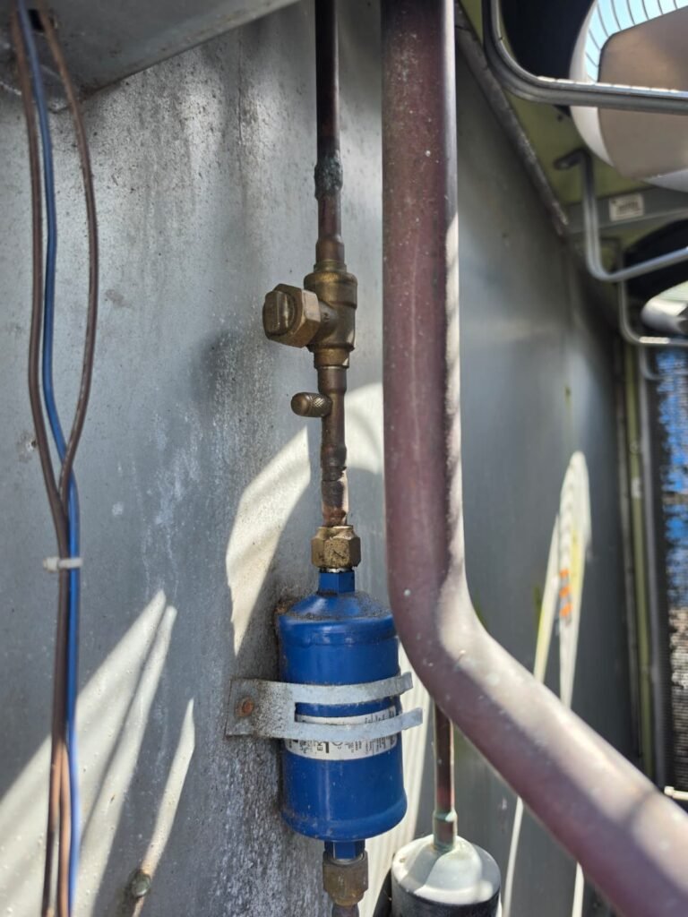 Close-up of filter drier and valve on HVAC line in Brandon, FL 33511