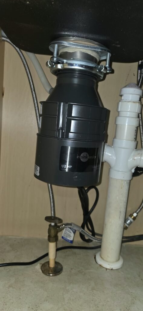Garbage disposal with plumbing connections in Lithia, FL 33547