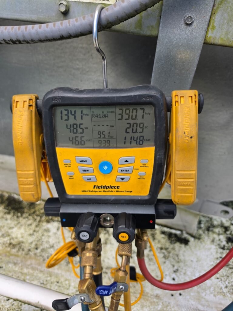 Manifold gauge with pressure and temperature readings in Brandon, FL 33511
