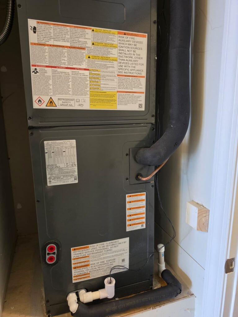 Goodman air handler unit with piping in Palm Harbor, FL 34684