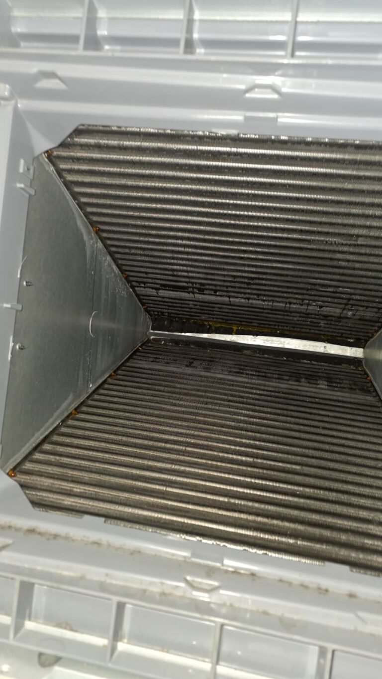 Close-up of HVAC coil inside unit in Tampa, FL 33625