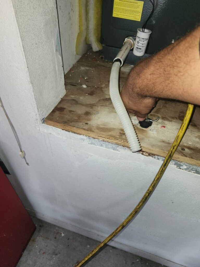 HVAC Component Adjustment in Tampa, FL 33635 Technician adjusting HVAC component in Tampa, FL 33635