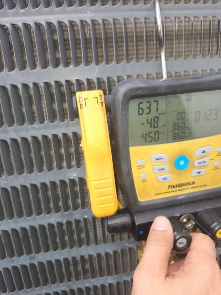 HVAC System Pressure Check in Tampa, FL 33635 Technician checking HVAC system pressure in Tampa, FL 33635